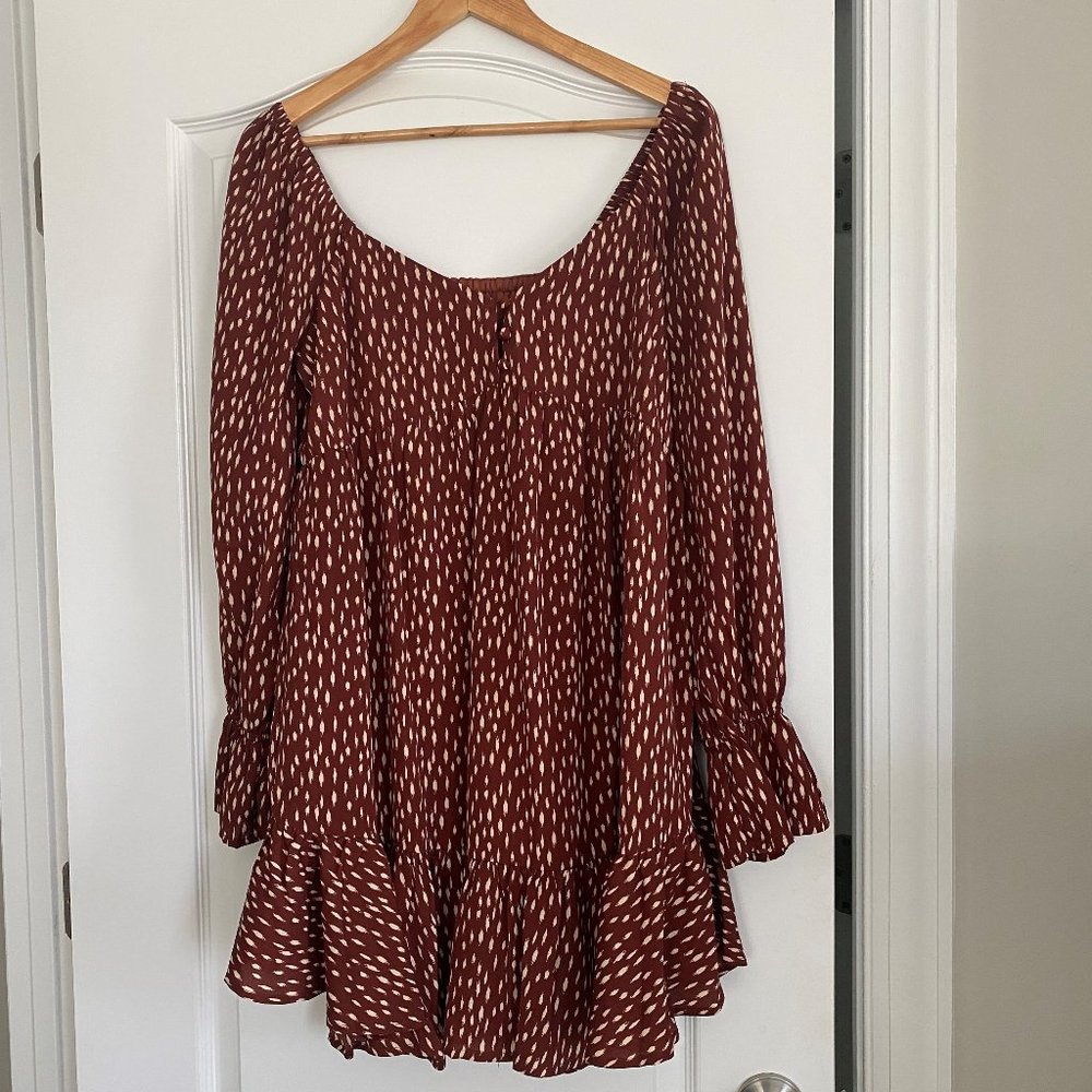 "New In" brown dress with cream brush like design.  The size is Large